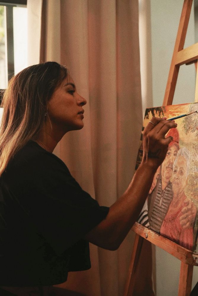 Close-up of Gigi painting