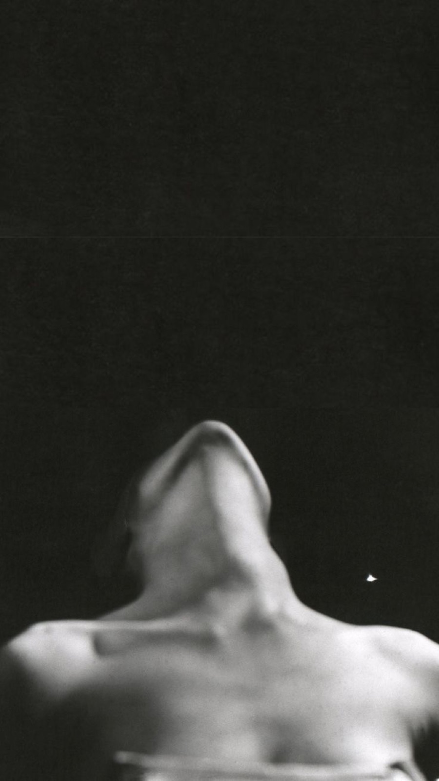 Black and white study of a neck and shoulder